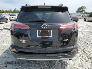 2018 Toyota RAV4 XLE with VIN 2T3WFREV2JW458816, listed as a Copart auction lot 53235105 with 135,469 mi miles and Salvage Title. Bid and sale history available at DreamBid. Image 6.