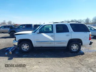 2003 GMC Yukon SLT with VIN 1GKEC13Z13J197955, listed as a IAAI auction lot 41586841 with 208,752 mi miles. Bid and sale history available at carsss.com. Image 14.