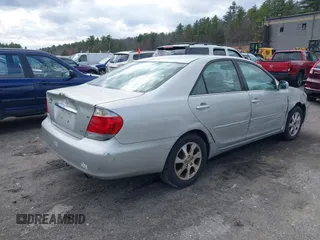 2006 Toyota Camry LE z VIN 4T1BF30K96U119883, wystawiony jako IAAI lot #41858665 z przebiegiem 228 340 mil mil oraz . Historia ofert i sprzedaży dostępna na DreamBid. Obrazek 4.