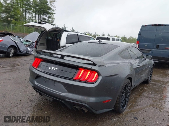 2022 Ford Mustang GT with VIN 1FA6P8CF1N5108602, listed as a IAAI auction lot 39889660 with 21,711 mi miles and . Bid and sale history available at DreamBid. Image 4.