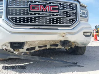 2017 GMC Sierra 1500 Denali with VIN 3GTU2PEC5HG164021, listed as a IAAI auction lot 41784101 with 69,167 mi miles and . Bid and sale history available at DreamBid. Image 6.