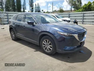 2018 Mazda CX-9 Touring with VIN JM3TCBCY3J0235048, listed as a Copart auction lot 61043915 with 82,869 mi miles and Salvage title. Bid and sale history available at DreamBid. Image 4.