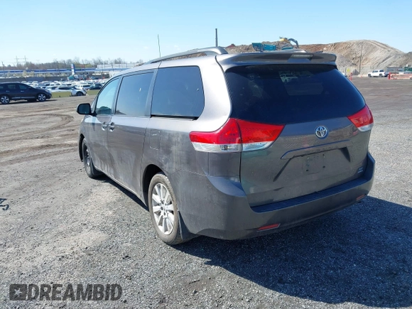 2011 Toyota Sienna LE with VIN 5TDJK3DC1BS016258, listed as a IAAI auction lot 41995140 with 200,903 mi miles. Bid and sale history available at carsss.com. Image 3.