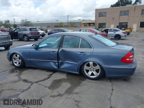 2003 Mercedes-Benz E-Class 3.2L with VIN WDBUF65JX3A144611, listed as a IAAI auction lot 41938167 with 1 mi miles. Bid and sale history available at carsss.com. Image 14.