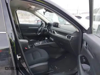 2023 Mazda CX-5 2.5 S with VIN JM3KFBAM3P0233411, listed as a IAAI auction lot 41339203 with 25,174 mi miles. Bid and sale history available at carsss.com. Image 5.