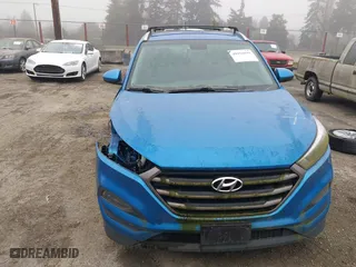 2016 Hyundai Tucson SE with VIN KM8J3CA43GU119562, listed as a IAAI auction lot 40950899 with 100,020 mi miles. Bid and sale history available at carsss.com. Image 13.