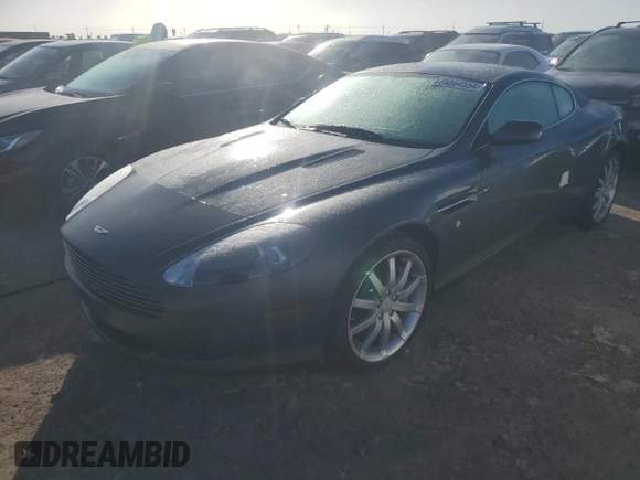 2005 Aston Martin DB9 z VIN SCFAD01A75GA02198, wystawiony jako Copart lot #75564554 z przebiegiem Nie podano mil oraz Nie do naprawy • Non repairable. Historia ofert i sprzedaży dostępna na DreamBid. Obrazek 1.