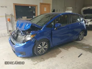 2015 Honda Fit EX-L z VIN 3HGGK5H82FM754220, wystawiony jako IAAI lot #42570240 z przebiegiem Nie podano mil oraz . Historia ofert i sprzedaży dostępna na DreamBid. Obrazek 17.