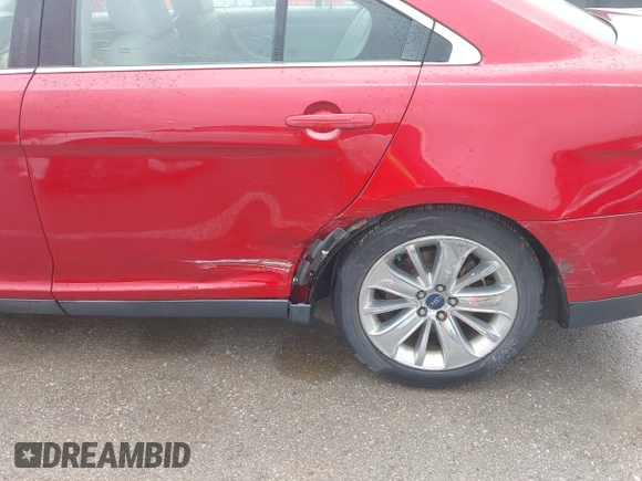 2011 Ford Taurus Limited with VIN 1FAHP2FW0BG142841, listed as a IAAI auction lot 42484629 with 82,621 mi miles and . Bid and sale history available at DreamBid. Image 6.