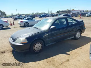 1997 Honda Civic DX with VIN 1HGEJ6120VL048384, listed as a IAAI auction lot 41866628 with 286,599 mi miles. Bid and sale history available at carsss.com. Image 2.