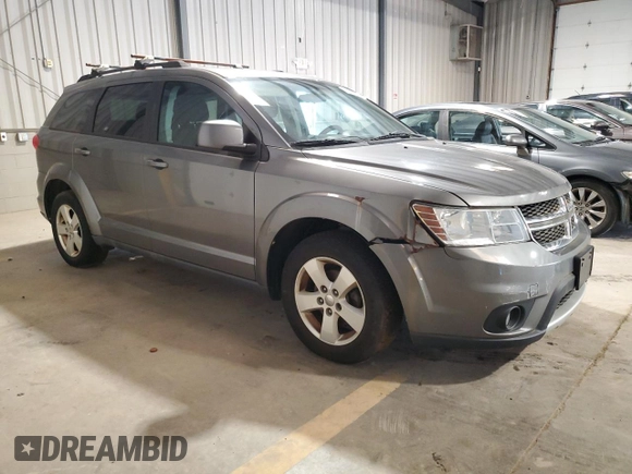 2012 Dodge Journey SXT with VIN 3C4PDDBG3CT168548, listed as a Copart auction lot 64881345 with 105,112 mi miles and Clean title. Bid and sale history available at DreamBid. Image 4.