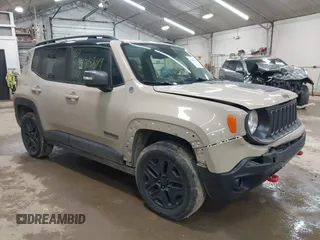 2017 Jeep Renegade Trailhawk z VIN ZACCJBCB6HPE97998, wystawiony jako IAAI lot #42435849 z przebiegiem 105 490 mil mil oraz . Historia ofert i sprzedaży dostępna na DreamBid. Obrazek 1.