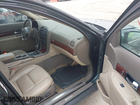 2002 Lincoln LS w/Base Pkg with VIN 1LNHM87A92Y685863, listed as a IAAI auction lot 41457021 with 145,022 mi miles. Bid and sale history available at carsss.com. Image 5.