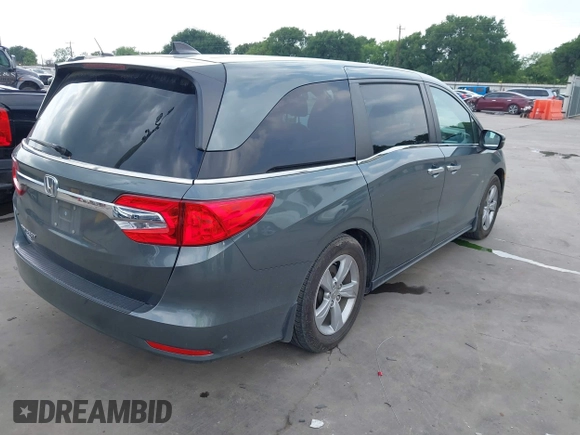 2018 Honda Odyssey EX-L with VIN 5FNRL6H74JB096849, listed as a IAAI auction lot 42136514 with 119,675 mi miles. Bid and sale history available at carsss.com. Image 4.