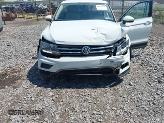 2018 Volkswagen Tiguan SEL with VIN 3VV3B7AX2JM060292, listed as a IAAI auction lot 42274534 with 97,604 mi miles and . Bid and sale history available at DreamBid. Image 6.