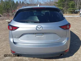 2021 Mazda CX-5 Grand Touring Reserve with VIN JM3KFBAY5M0472988, listed as a IAAI auction lot 41897855 with 27,318 mi miles. Bid and sale history available at carsss.com. Image 17.