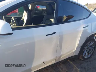 2023 Tesla Model Y Long Range with VIN 7SAYGAEE3PF753657, listed as a IAAI auction lot 41668917 with 33,301 mi miles and . Bid and sale history available at DreamBid. Image 20.