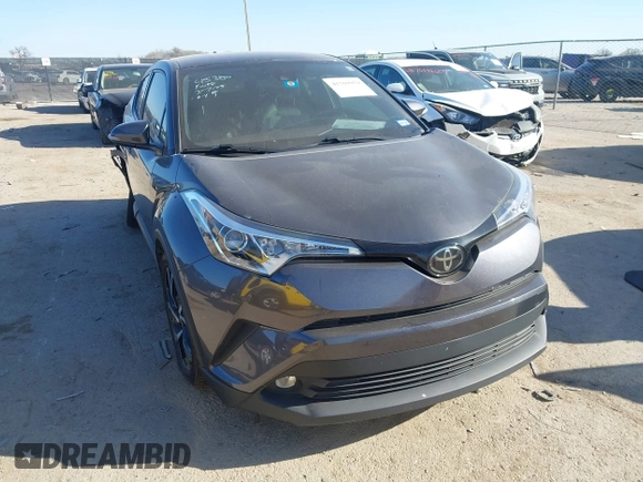2019 Toyota C-HR XLE with VIN JTNKHMBX1K1062180, listed as a IAAI auction lot 41769979 with 75,159 mi miles. Bid and sale history available at carsss.com. Image 1.