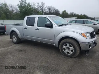 2007 Nissan Frontier SE with VIN 1N6AD09W97C423634, listed as a Copart auction lot 60997335 with 161,871 mi miles and Salvage title. Bid and sale history available at DreamBid. Image 4.