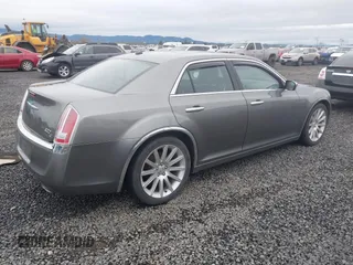 2011 Chrysler 300 with VIN 2C3CA6CT8BH547555, listed as a IAAI auction lot 41858626 with 141,853 mi miles. Bid and sale history available at carsss.com. Image 4.
