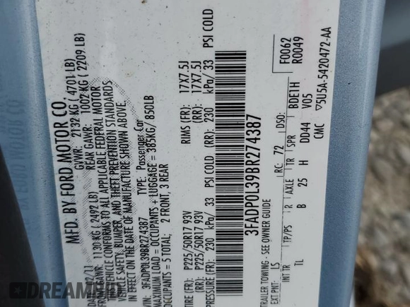 2011 Ford Fusion Hybrid with VIN 3FADP0L39BR274387, listed as a Copart auction lot 60657425 with 118,898 mi miles and Salvage title. Bid and sale history available at DreamBid. Image 12.