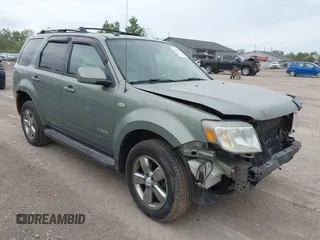 2008 Mercury Mariner Premier z VIN 4M2CU97198KJ41566, wystawiony jako IAAI lot #42311149 z przebiegiem 155 294 mil mil oraz . Historia ofert i sprzedaży dostępna na DreamBid. Obrazek 1.