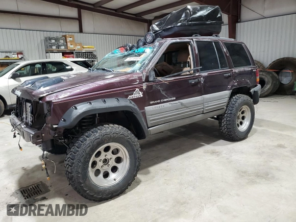 1996 Jeep Grand Cherokee Laredo with VIN 1J4GZ58Y1TC171915, listed as a Copart auction lot 50764034 with 0 mi miles and Salvage Title. Bid and sale history available at carsss.com. Image 1.