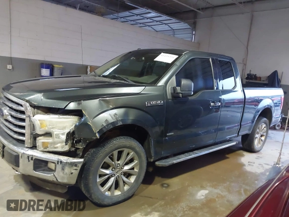 2015 Ford F-150 XLT with VIN 1FTEX1EP3FKE57475, listed as a IAAI auction lot 41435394 with 233,560 mi miles. Bid and sale history available at carsss.com. Image 14.