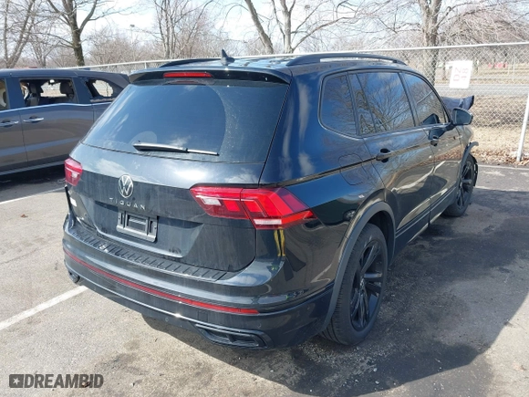 2023 Volkswagen Tiguan SE R-Line Black with VIN 3VVCB7AXXPM094621, listed as a IAAI auction lot 41737103 with 21,069 mi miles. Bid and sale history available at carsss.com. Image 4.