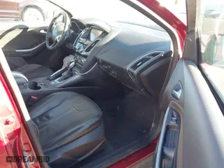 2014 Ford Focus Titanium with VIN 1FADP3J23EL137525, listed as a IAAI auction lot 41562684 with 127,104 mi miles. Bid and sale history available at carsss.com. Image 5.