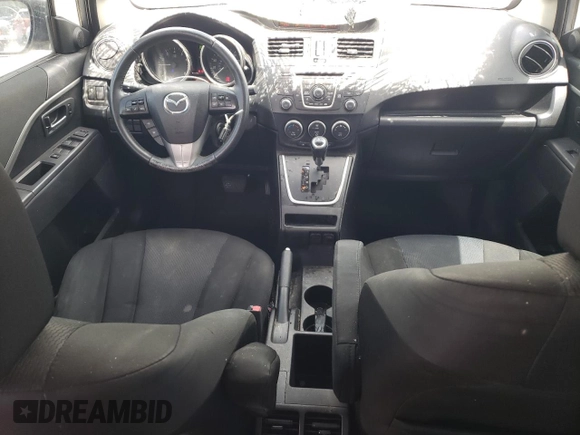 2015 Mazda 5 Touring z VIN JM1CW2CL4F0188463, wystawiony jako Copart lot #57597535 z przebiegiem 159 388 mil mil oraz Szkoda całkowita • Salvage title. Historia ofert i sprzedaży dostępna na DreamBid. Obrazek 8.