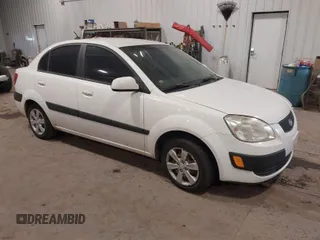 2009 Kia Rio SX with VIN KNADE223896533839, listed as a IAAI auction lot 41328220 with 140,968 mi miles. Bid and sale history available at carsss.com. Image 1.