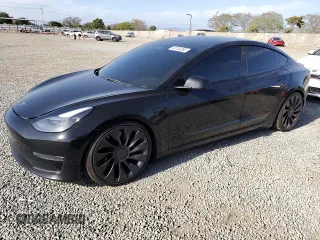 2023 Tesla Model 3 Performance z VIN 5YJ3E1EC9PF414218, wystawiony jako Copart lot #53105285 z przebiegiem 60 745 mil mil oraz Szkoda całkowita • Salvage title. Historia ofert i sprzedaży dostępna na DreamBid. Obrazek 1.