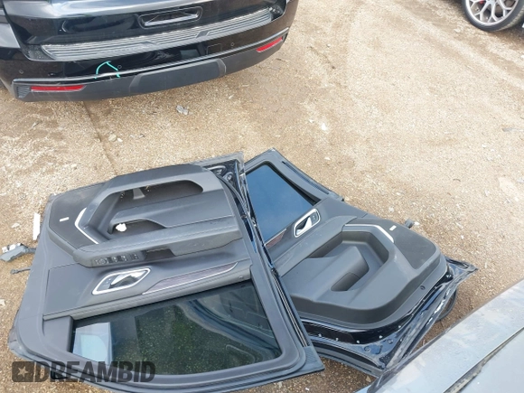2023 Chevrolet Tahoe Z71 with VIN 1GNSKPKD9PR389603, listed as a IAAI auction lot 42082916 with 33,843 mi miles and . Bid and sale history available at DreamBid. Image 12.