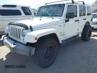 2017 Jeep Wrangler Unlimited Sahara with VIN 1C4BJWEG5HL588535, listed as a IAAI auction lot 42013571 with 70,012 mi miles. Bid and sale history available at carsss.com. Image 18.
