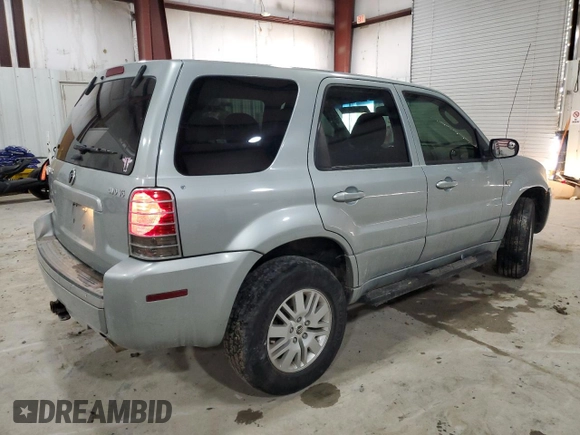 2005 Mercury Mariner Luxury z VIN 4M2CU57135DJ00228, wystawiony jako Copart lot #87603775 z przebiegiem 169 099 mil mil oraz Szkody całkowita. Historia ofert i sprzedaży dostępna na DreamBid. Obrazek 3.