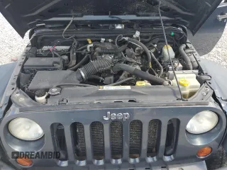 2008 Jeep Wrangler X z VIN 1J4FA24178L619687, wystawiony jako Copart lot #62535985 z przebiegiem 137 710 mil mil oraz Szkoda całkowita • Salvage title. Historia ofert i sprzedaży dostępna na DreamBid. Obrazek 12.