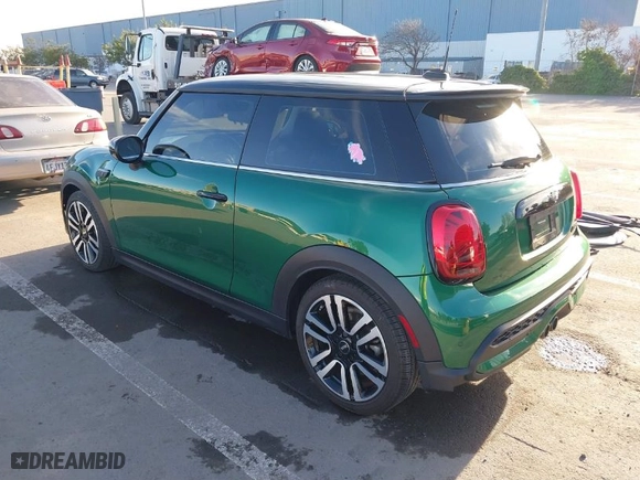 2023 MINI Hardtop 2 Door Cooper S with VIN WMW53DH03P2T74008, listed as a IAAI auction lot 41398466 with 13,609 mi miles. Bid and sale history available at carsss.com. Image 3.
