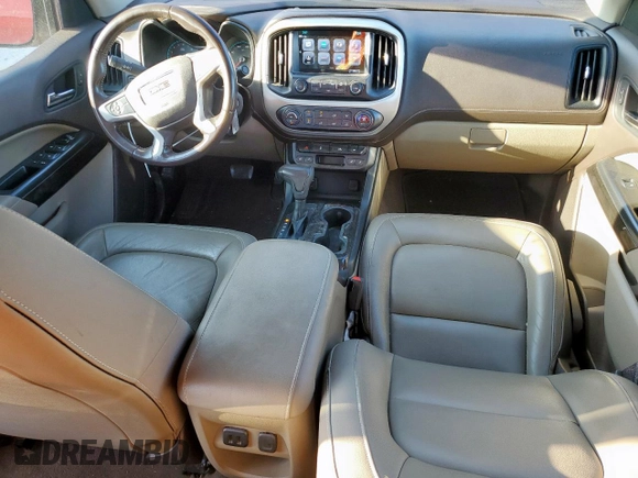 2017 GMC Canyon 2WD SLT z VIN 1GTG5DEN9H1305739, wystawiony jako Copart lot #58194755 z przebiegiem 133 571 mil mil oraz Szkoda całkowita • Salvage title. Historia ofert i sprzedaży dostępna na DreamBid. Obrazek 8.