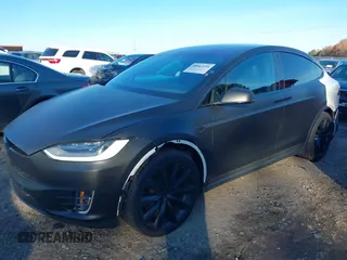 2020 Tesla Model X Long Range with VIN 5YJXCDE28LF298553, listed as a IAAI auction lot 40863184 with 54,031 mi miles and . Bid and sale history available at DreamBid. Image 19.