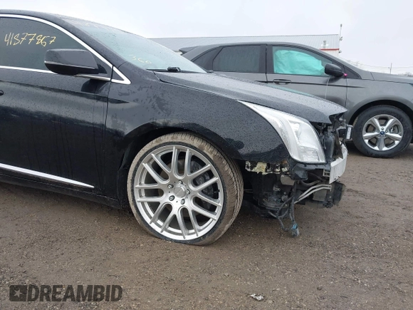 2014 Cadillac XTS Platinum with VIN 2G61W5S84E9291640, listed as a IAAI auction lot 41877867 with 100,462 mi miles and . Bid and sale history available at DreamBid. Image 19.