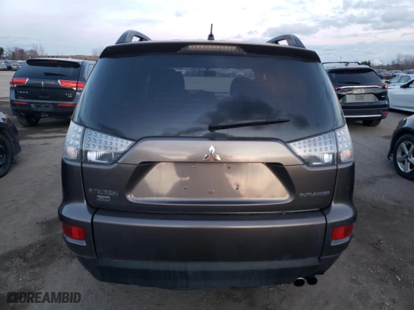 2011 Mitsubishi Outlander LS with VIN JA4JT3AXXBU610616, listed as a Copart auction lot 82882744 with 309,979 mi miles and Clean Title. Bid and sale history available at carsss.com. Image 6.