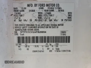 2010 Ford F-150 XL with VIN 1FTFX1CV2AFB26894, listed as a Copart auction lot 45050105 with 211,770 mi miles and Salvage Title. Bid and sale history available at carsss.com. Image 13.