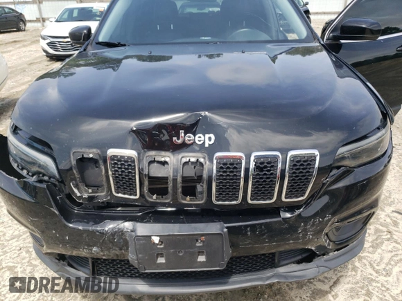 2019 Jeep Cherokee Latitude Plus with VIN 1C4PJMLB7KD101158, listed as a Copart auction lot 58246115 with 144,807 mi miles and Salvage title. Bid and sale history available at DreamBid. Image 12.