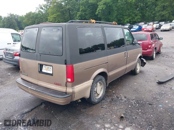 1999 GMC Safari with VIN 1GKDM19WXXB523158, listed as a IAAI auction lot 37840214 with Not Provided miles. Bid and sale history available at carsss.com. Image 4.