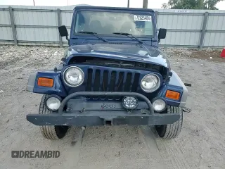 2002 Jeep Wrangler Sport with VIN 1J4FA49S72P722606, listed as a Copart auction lot 72525484 with 104,391 mi miles and Salvage Title. Bid and sale history available at carsss.com. Image 11.