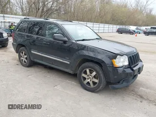 2009 Jeep Grand Cherokee Laredo with VIN 1J8GR48K19C546439, listed as a IAAI auction lot 42097256 with 146,930 mi miles. Bid and sale history available at carsss.com. Image 1.