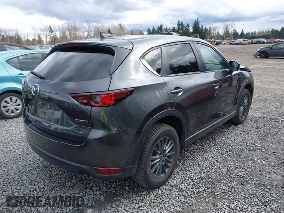2021 Mazda CX-5 Touring with VIN JM3KFBCM2M0484011, listed as a IAAI auction lot 41825954 with 48,958 mi miles. Bid and sale history available at carsss.com. Image 4.