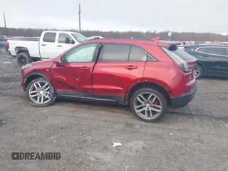 2021 Cadillac XT4 AWD Sport with VIN 1GYFZFR43MF006039, listed as a IAAI auction lot 41845105 with 19,289 mi miles and . Bid and sale history available at DreamBid. Image 14.