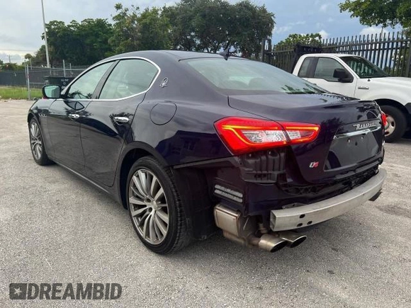 2015 Maserati Ghibli z VIN ZAM57XSA2F1159438, wystawiony jako Copart lot #49187735 z przebiegiem 73 996 mil mil oraz Szkoda całkowita • Salvage title. Historia ofert i sprzedaży dostępna na DreamBid. Obrazek 2.